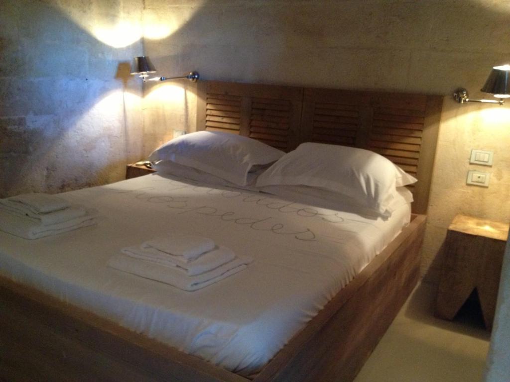 L'Hotel In Pietra Матера Стая снимка